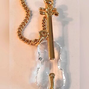 Gold SWAROWVSKY neclase With Musical Instrument Cristal